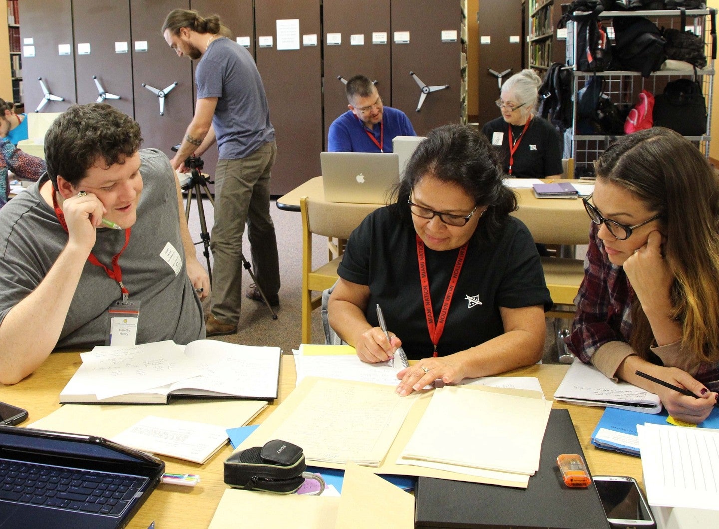 Photo of Native American students around table