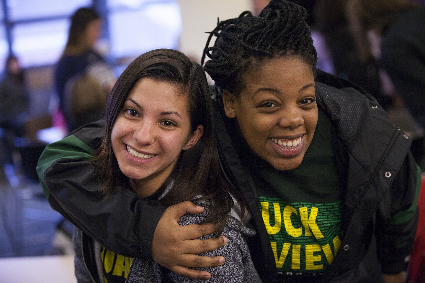 students hugging