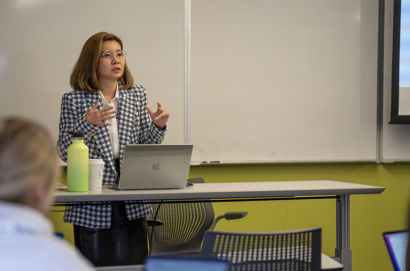 instructor in front of classroom