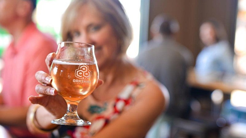 Woman holding a glass of wine