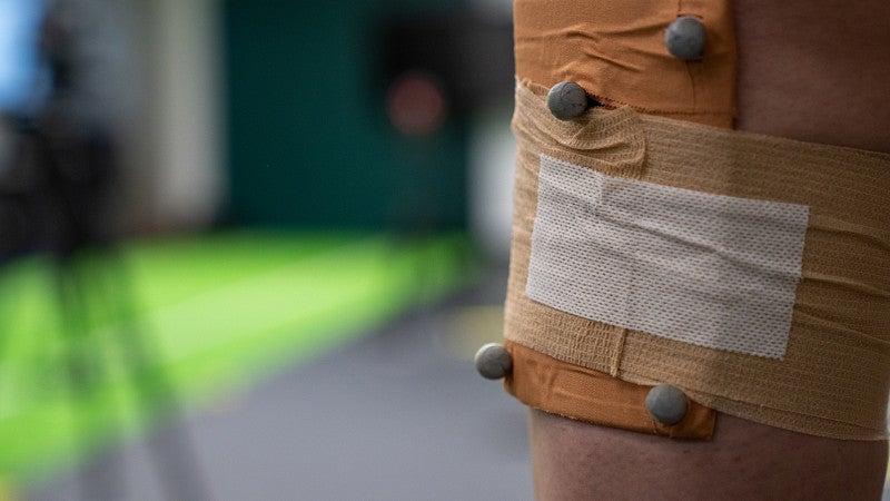 limb wrapped in scientific equipment in the Bowerman Sports Science Center 