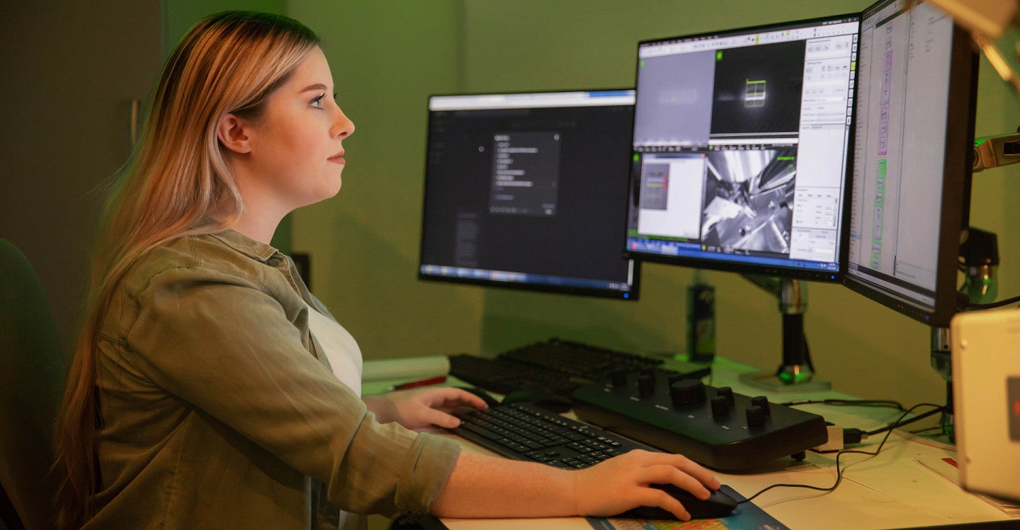 person on computer