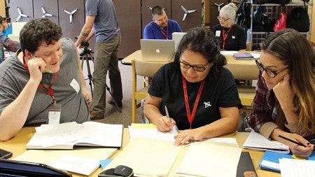 Photo of Native American students around table